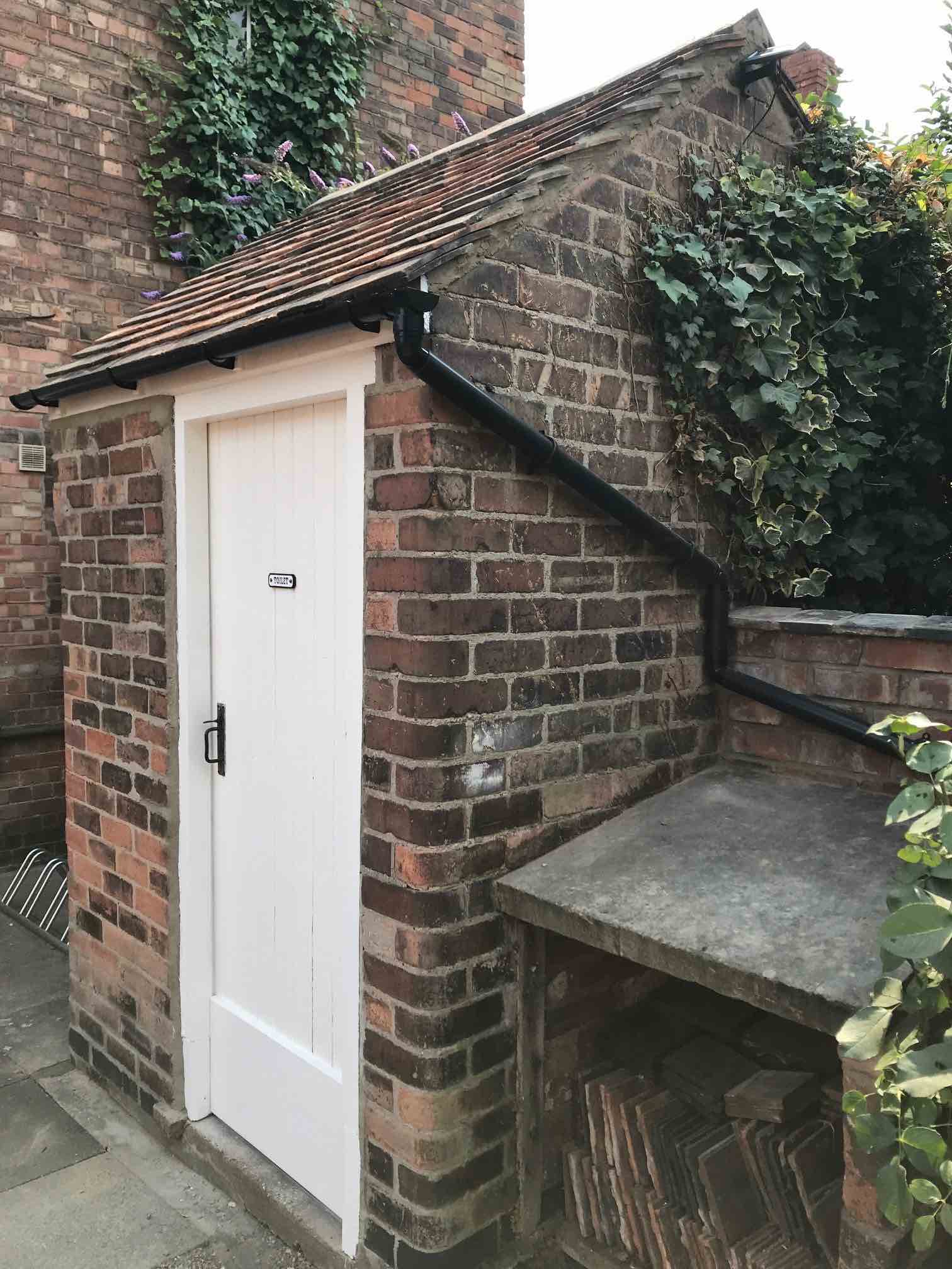 Exterior of the privy